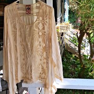 Johnny was, cream colored, rayon tunic long sleeves, with roll-up sleeve buttons